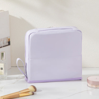 Trousse à cosmétiques élégante à compartiments, à main